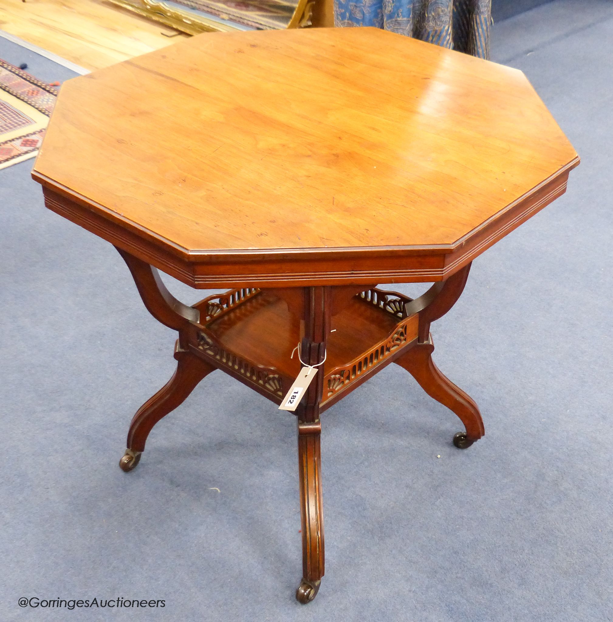 A Late Victorian walnut octagonal centre table, 75.5 cm wide, 69 cm high